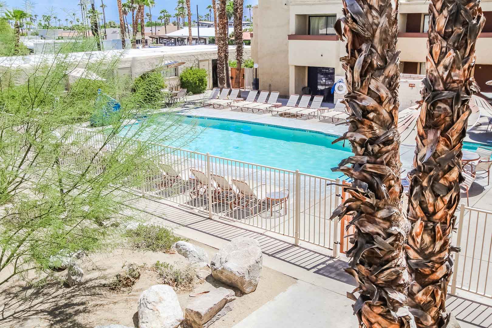 A clear and clean swimming pool at VRI's Desert Vacation Villas in Palm Springs California.